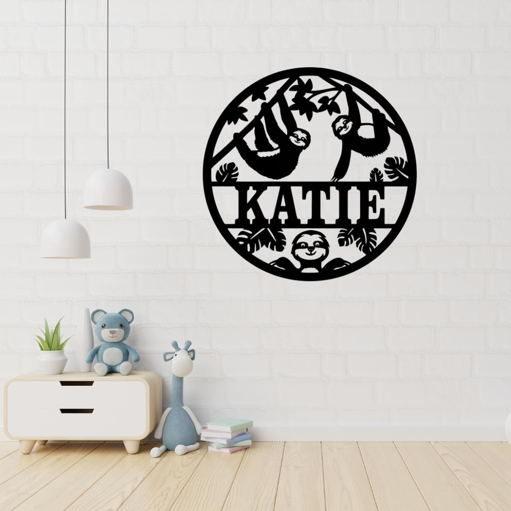Jungle sloth wall art displayed in a tropical-themed nursery
