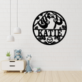 Jungle sloth wall art displayed in a tropical-themed nursery