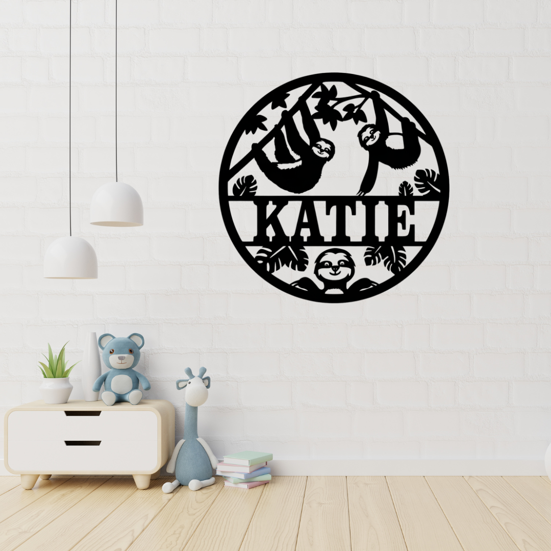 Jungle sloth wall art displayed in a tropical-themed nursery