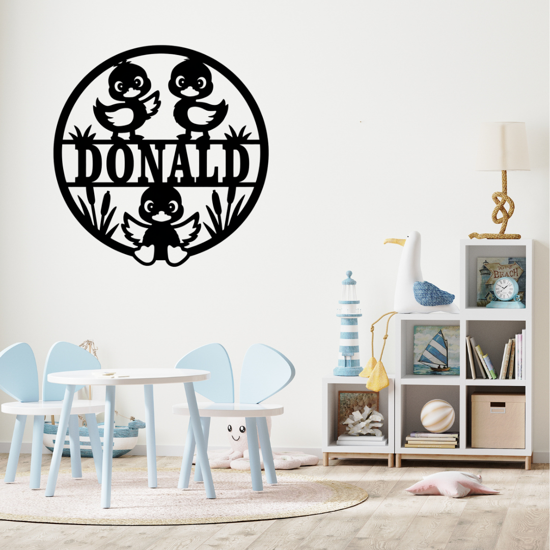 Cute duck-themed décor styled above a nursery crib