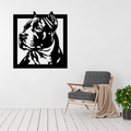 Loyal Guardian | Pitbull Terrier Square Frame Metal Wall Art displayed on a modern living room wall above a grey accent chair, featuring a detailed Pitbull Terrier portrait in a bold square black metal frame.