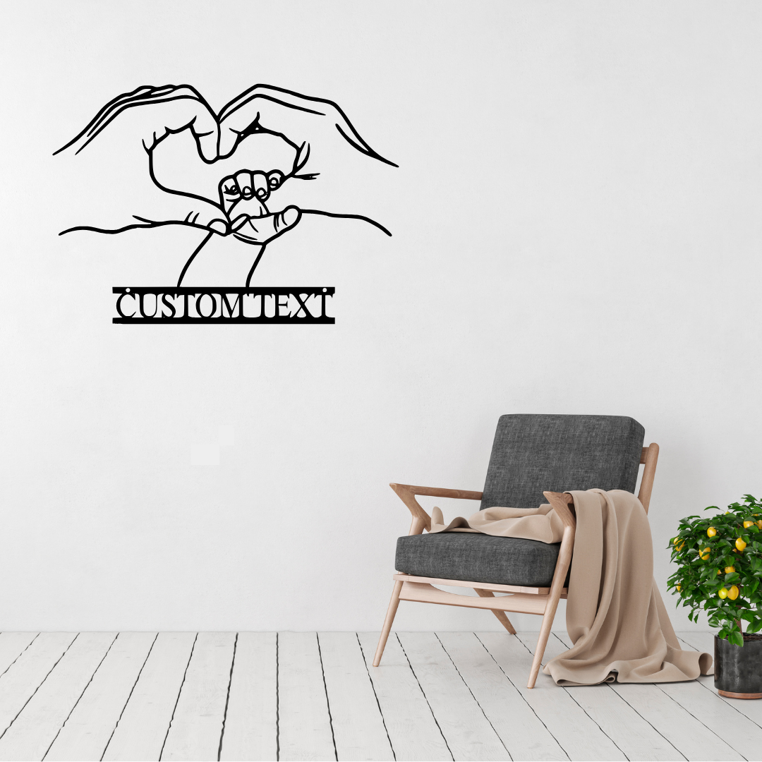 Made for Us personalised hands and heart metal wall art displayed above a contemporary chair in a stylish modern interior