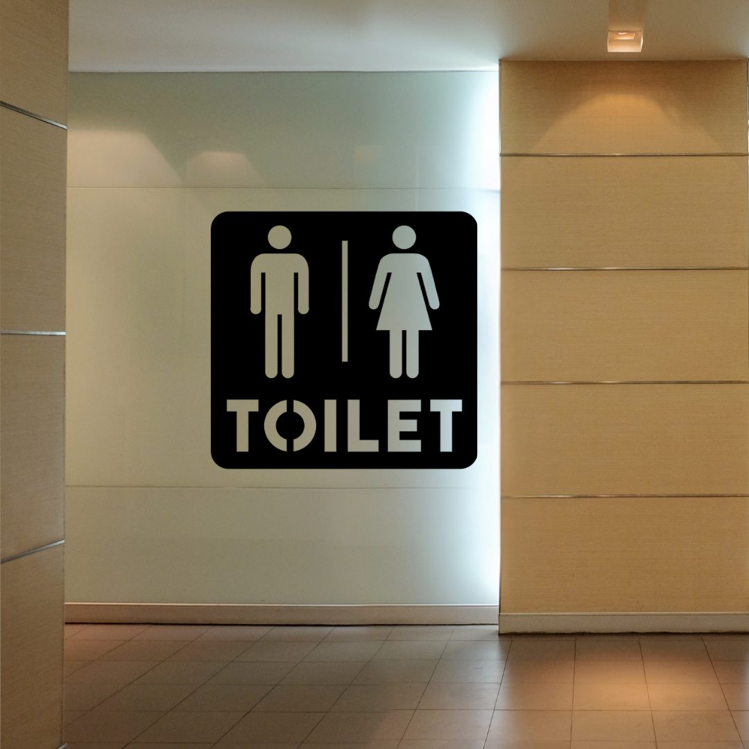 Toilet Sign | Male & Female Restroom Sign mounted on a modern commercial restroom wall.