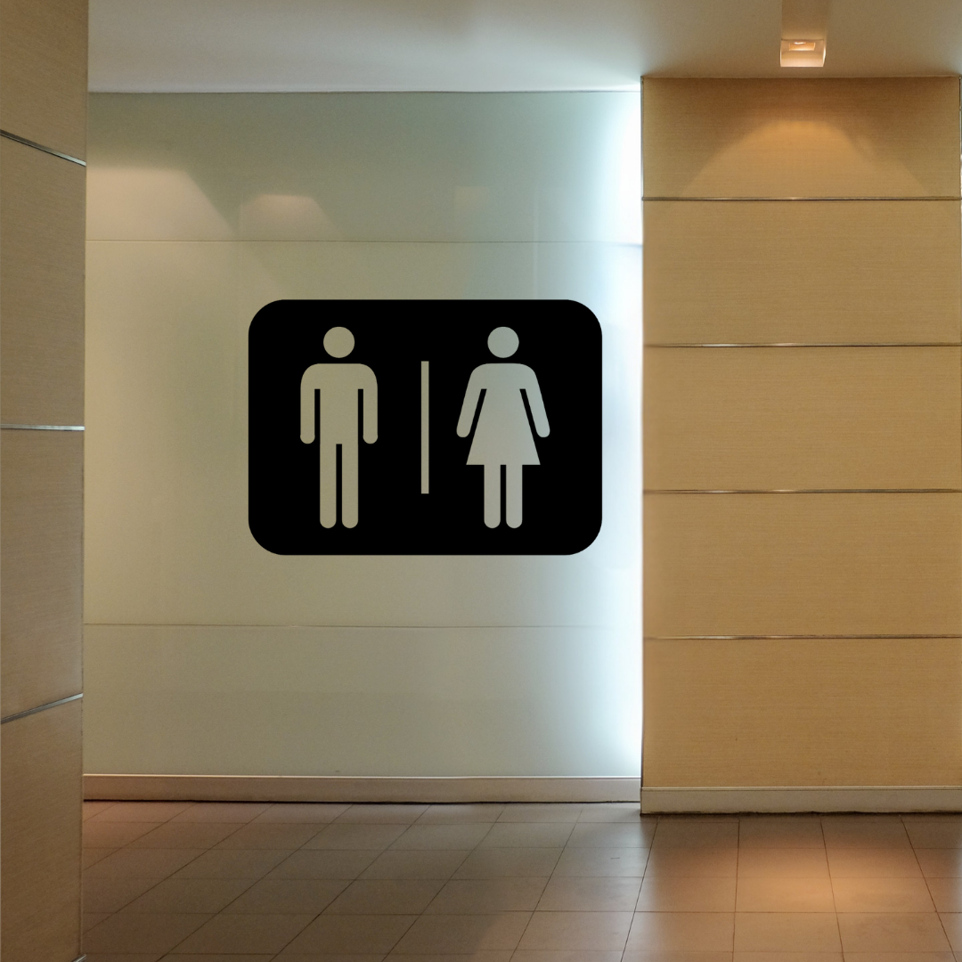 Male & Female Toilet Symbol | Metal Bathroom Sign mounted on a contemporary commercial restroom wall.