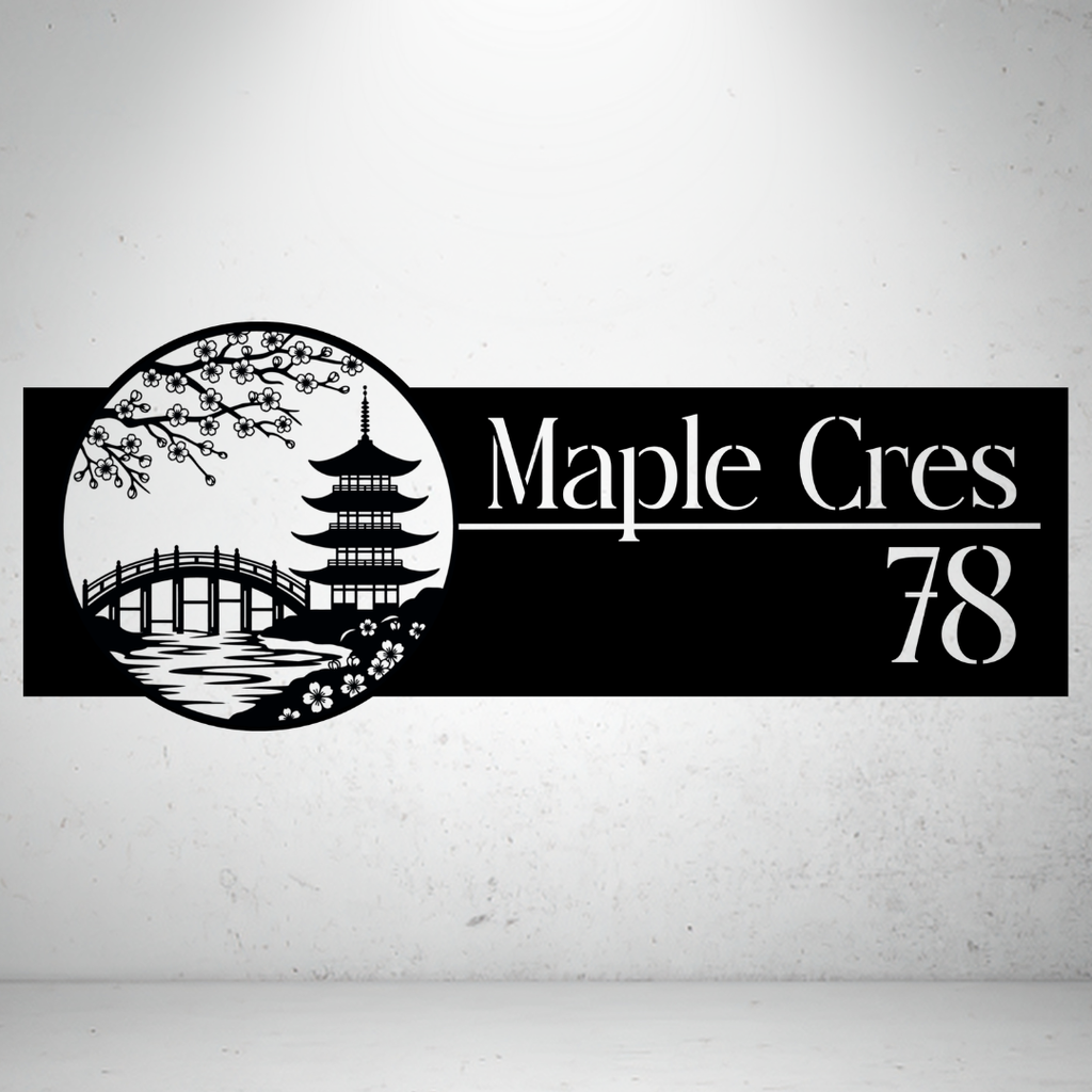 Maple Crescent personalised landscape metal house number sign featuring a Japanese garden with a pagoda, bridge, and cherry blossom branches.