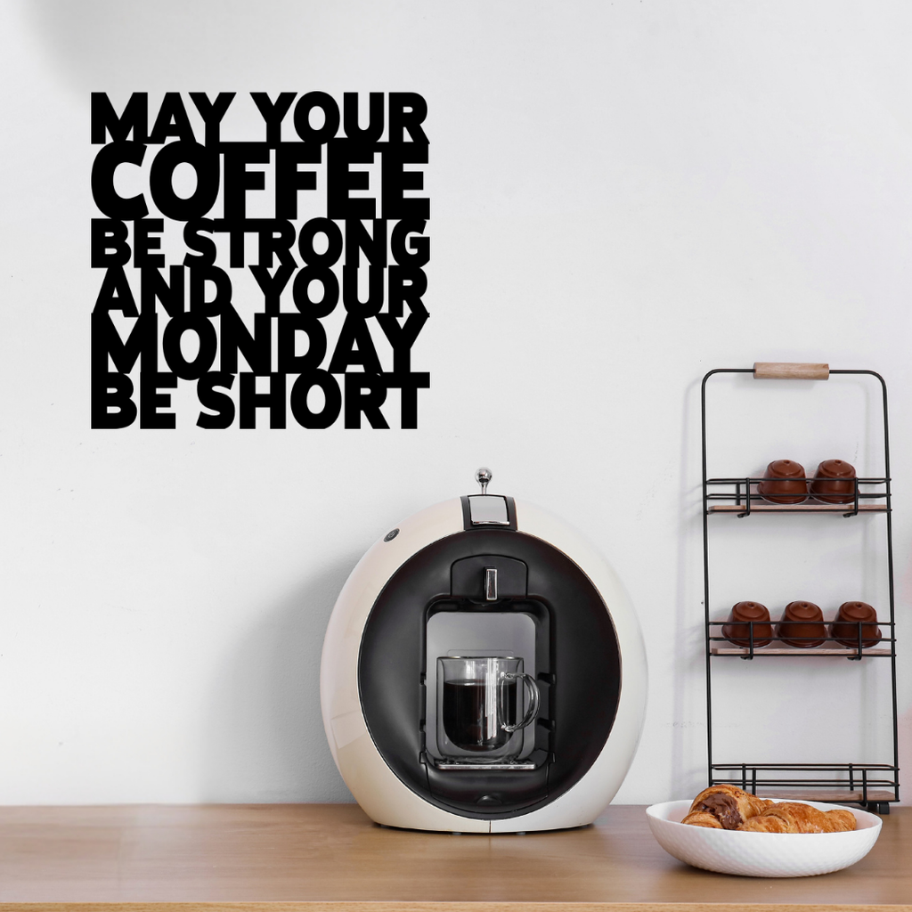 May Your Coffee Be Strong & Your Monday Be Short | Funny Coffee Metal Wall Art showcased above a stylish home coffee station with an espresso machine and coffee accessories.