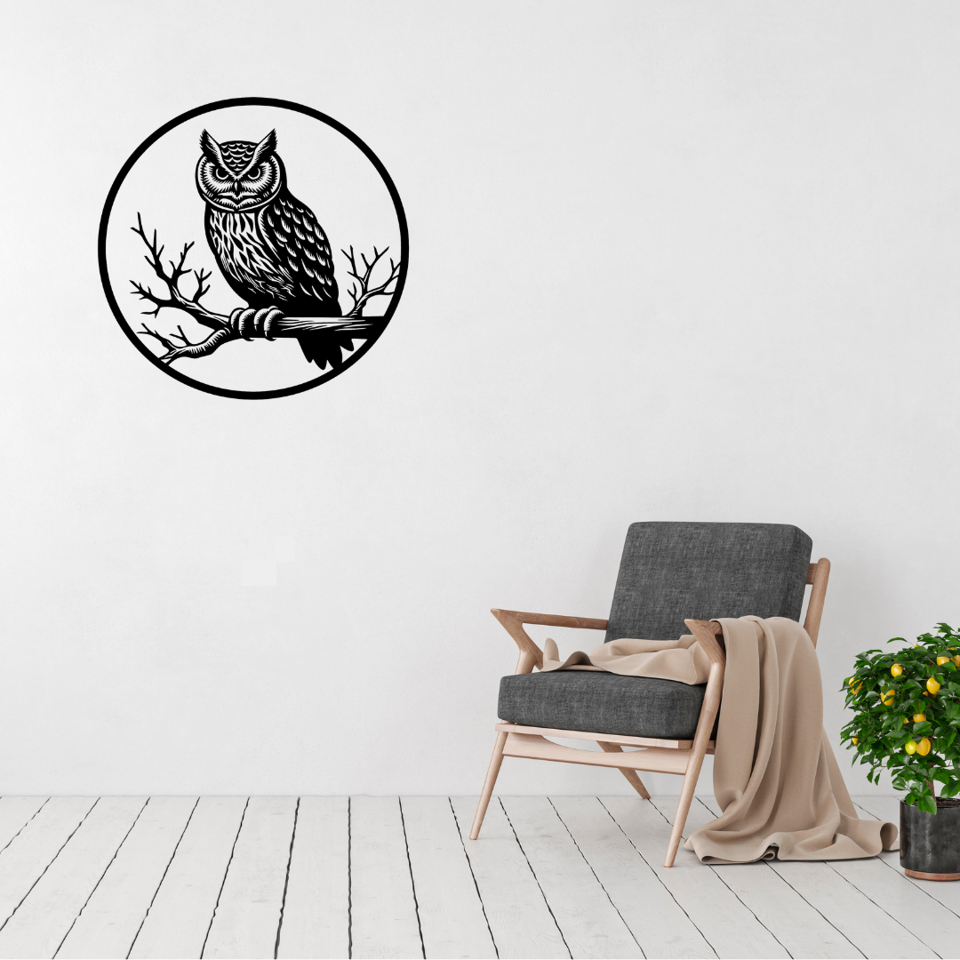 Midnight Watcher | Owl Metal Wall Art displayed in a bright contemporary living room, featuring a beautifully detailed owl perched on a tree branch within a circular black metal frame.