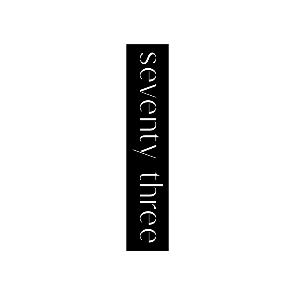 Modern vertical custom metal house name sign with a clean minimalist design for contemporary homes.