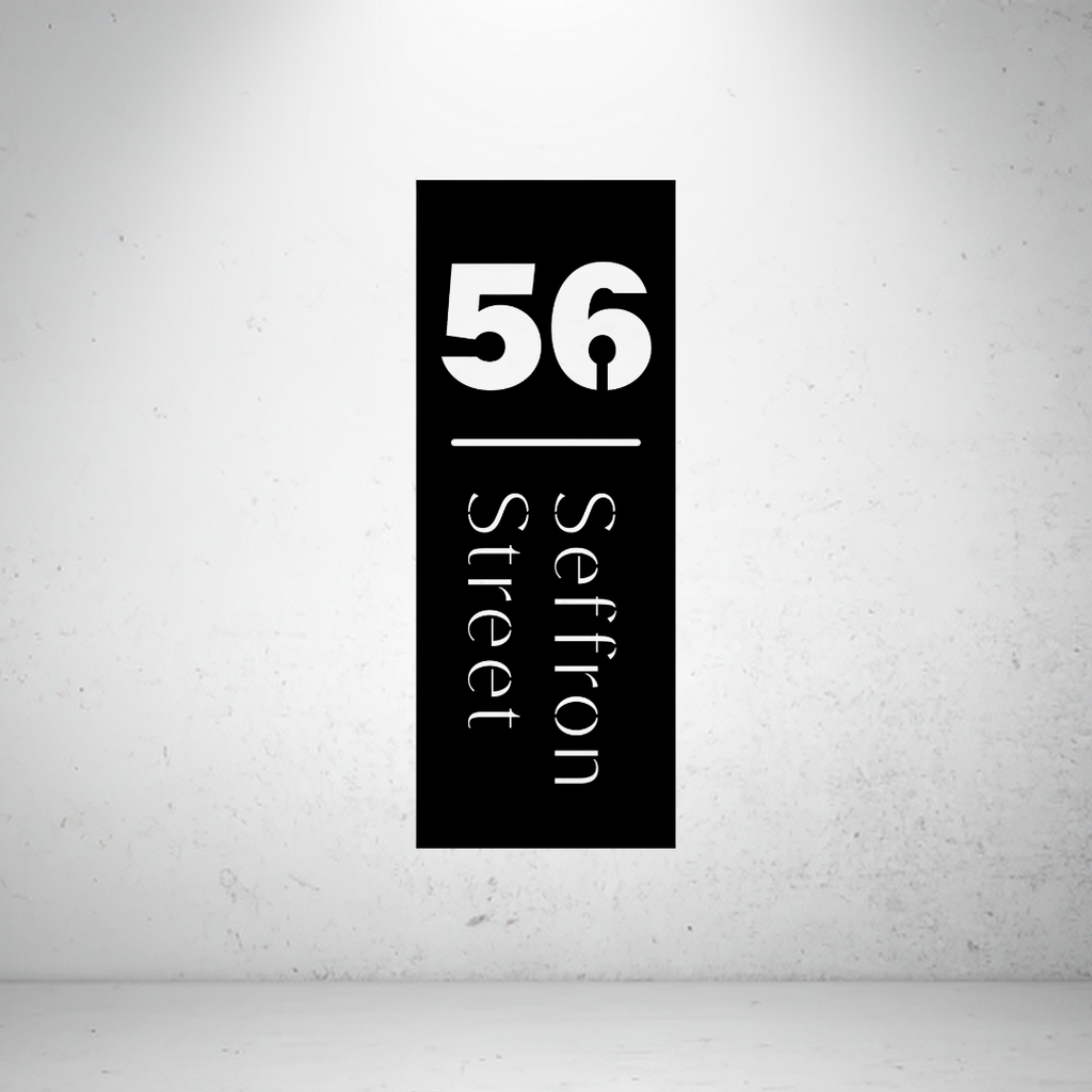 Modern vertical metal address sign featuring a custom house number and vertically displayed street name.