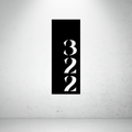 Modern vertical metal house number sign featuring a minimalist stacked address number design.