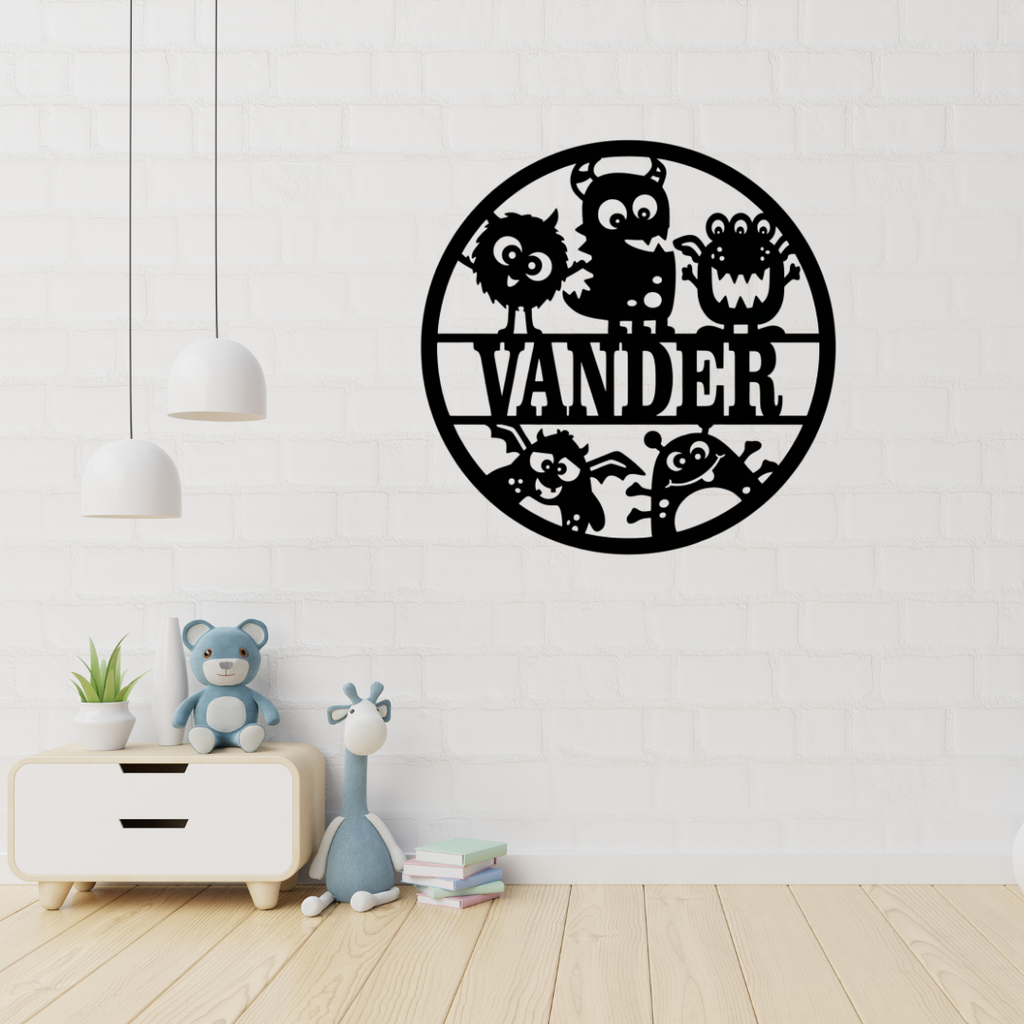 Playful monster wall art displayed in a colourful nursery space