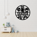 Playful monster wall art displayed in a colourful nursery space