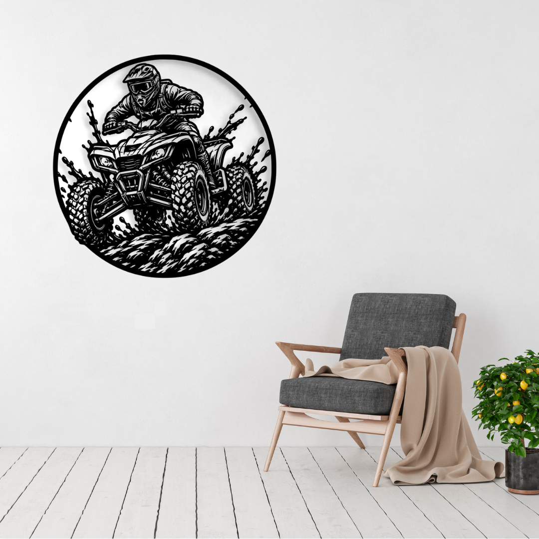 Mud Runner | ATV Quad Bike Circular Metal Wall Art displayed on a modern living room wall above a grey accent chair, featuring an off-road quad bike rider powering through rugged terrain in a circular black metal design.