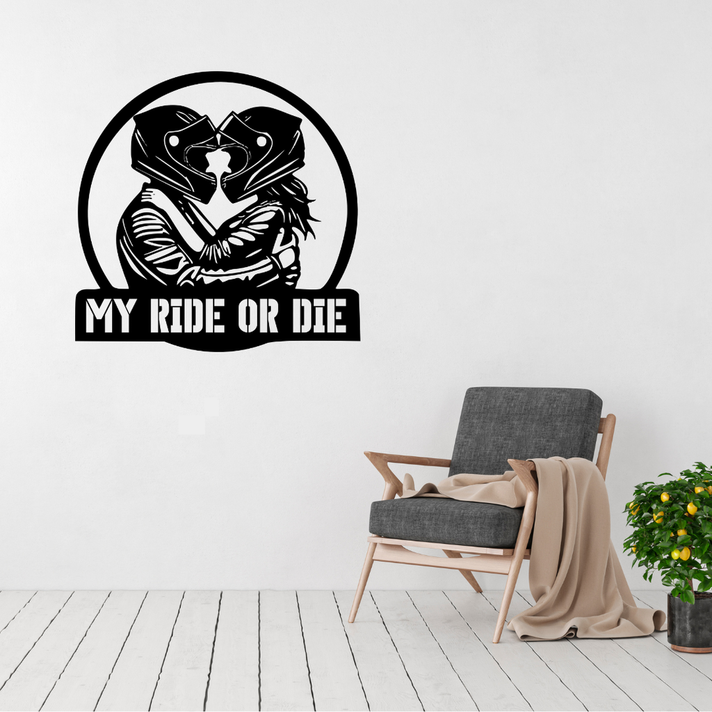 My Ride or Die motorcycle couple metal wall art displayed above a contemporary chair