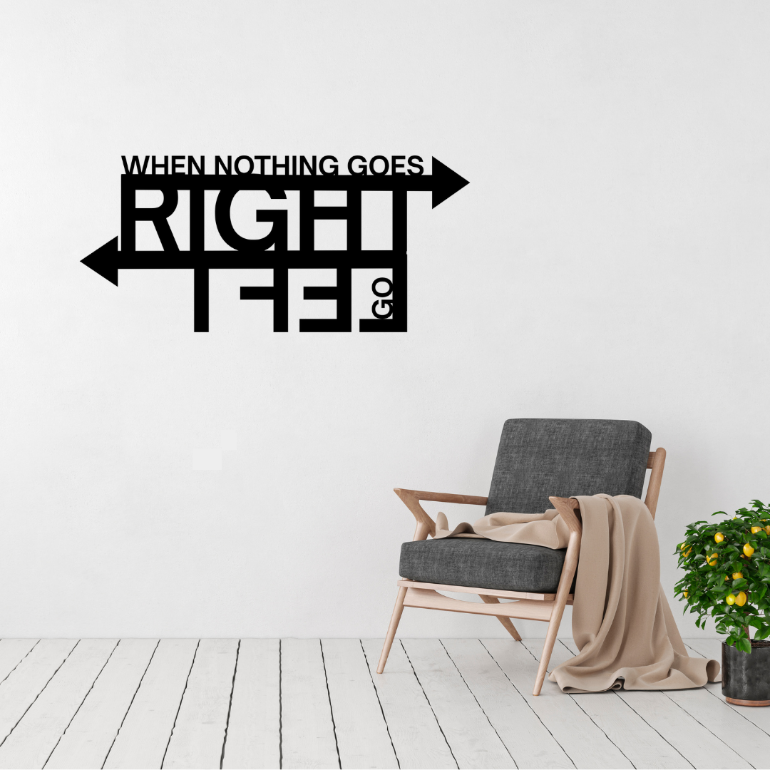 New Directions | When Nothing Goes Right Go Left Metal Wall Art displayed in a modern living room.