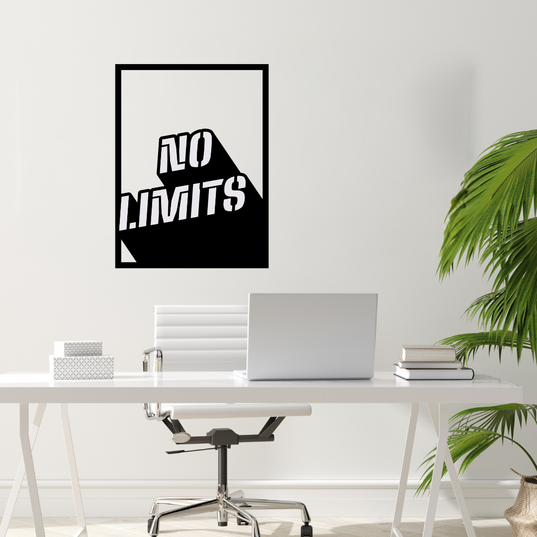 No Limits motivational metal wall art installed above a modern office desk in a bright minimalist workspace.