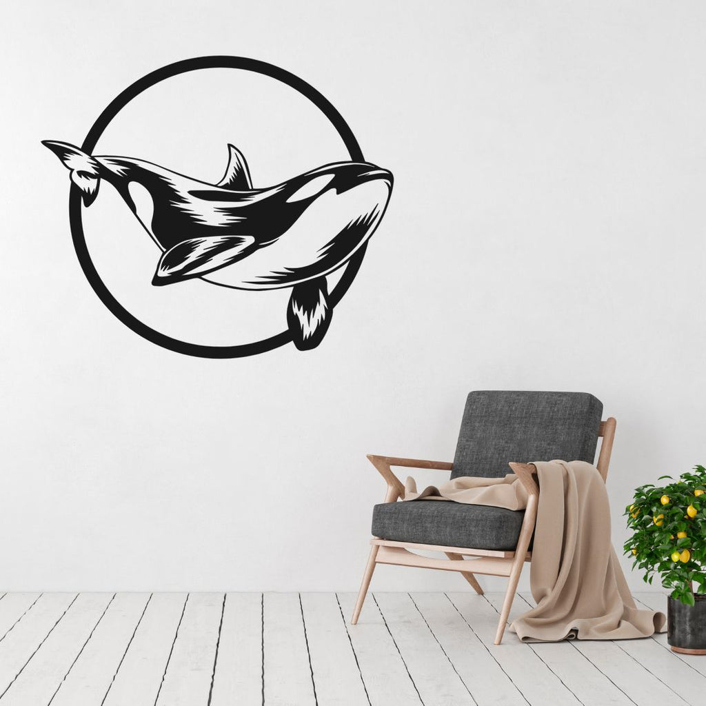 Orca wall art displayed in a coastal themed interior space