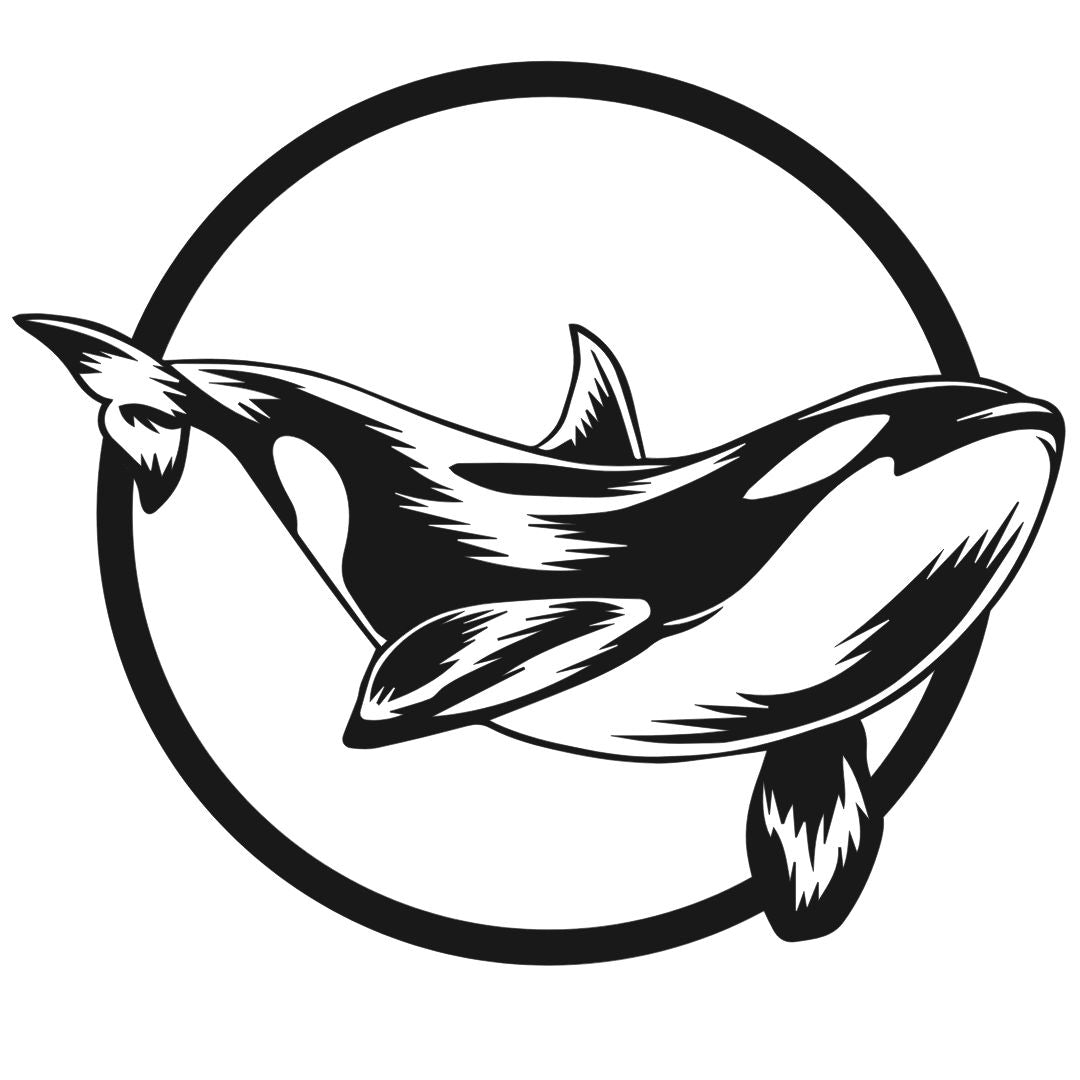 Orca whale metal wall art in circular frame ocean inspired design