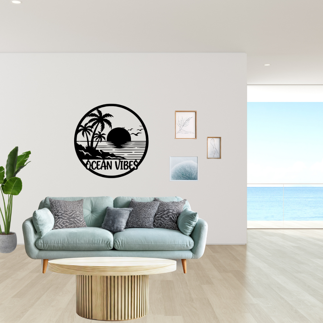 Ocean Vibes | Tropical Sunset Metal Wall Art showcased in a contemporary coastal-inspired living room, featuring a tropical sunset, palm trees and ocean scene in a premium circular black metal wall art perfect for beach house décor.