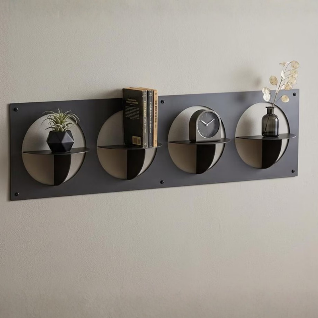 Contemporary circular wall shelf panel styled with plants and decorative accents