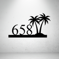 Metal house number sign with minimalist palm detailing on a grey background