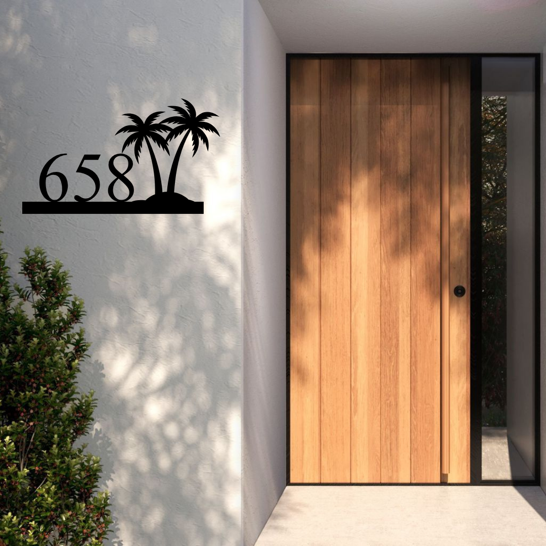 Metal house number palm silhouette sign displayed at a contemporary house entrance
