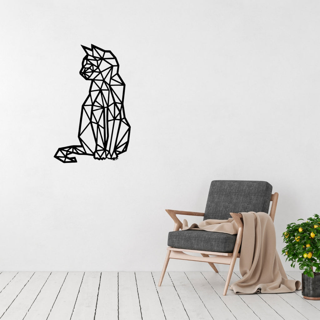 Geometric cat metal wall art displayed in a minimalist modern living room interior