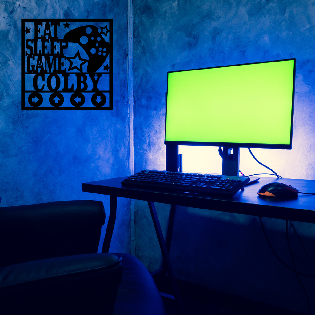 Gaming room metal wall sign displayed above a modern gamer setup