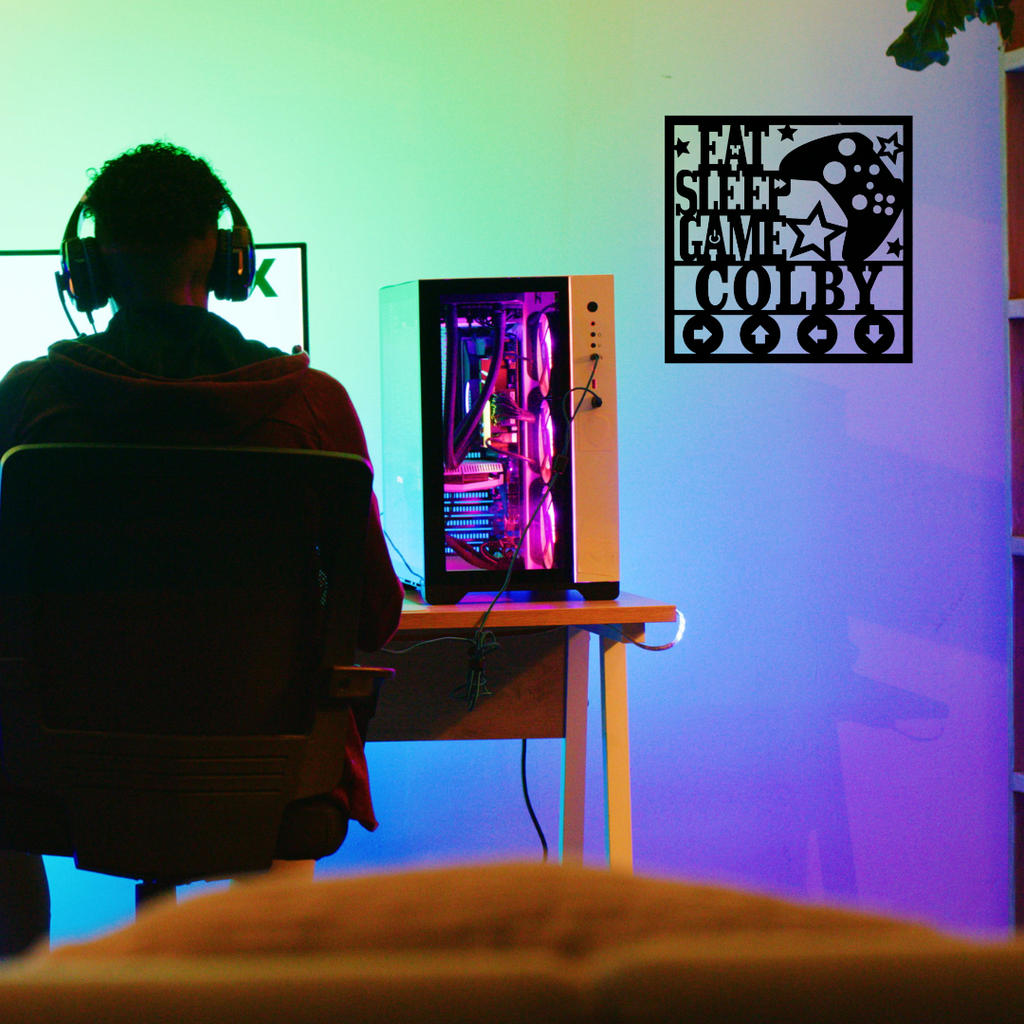 Gamer metal wall décor styled in a neon-lit entertainment room