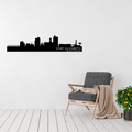 Port Elizabeth South Africa skyline metal wall art displayed above a contemporary chair