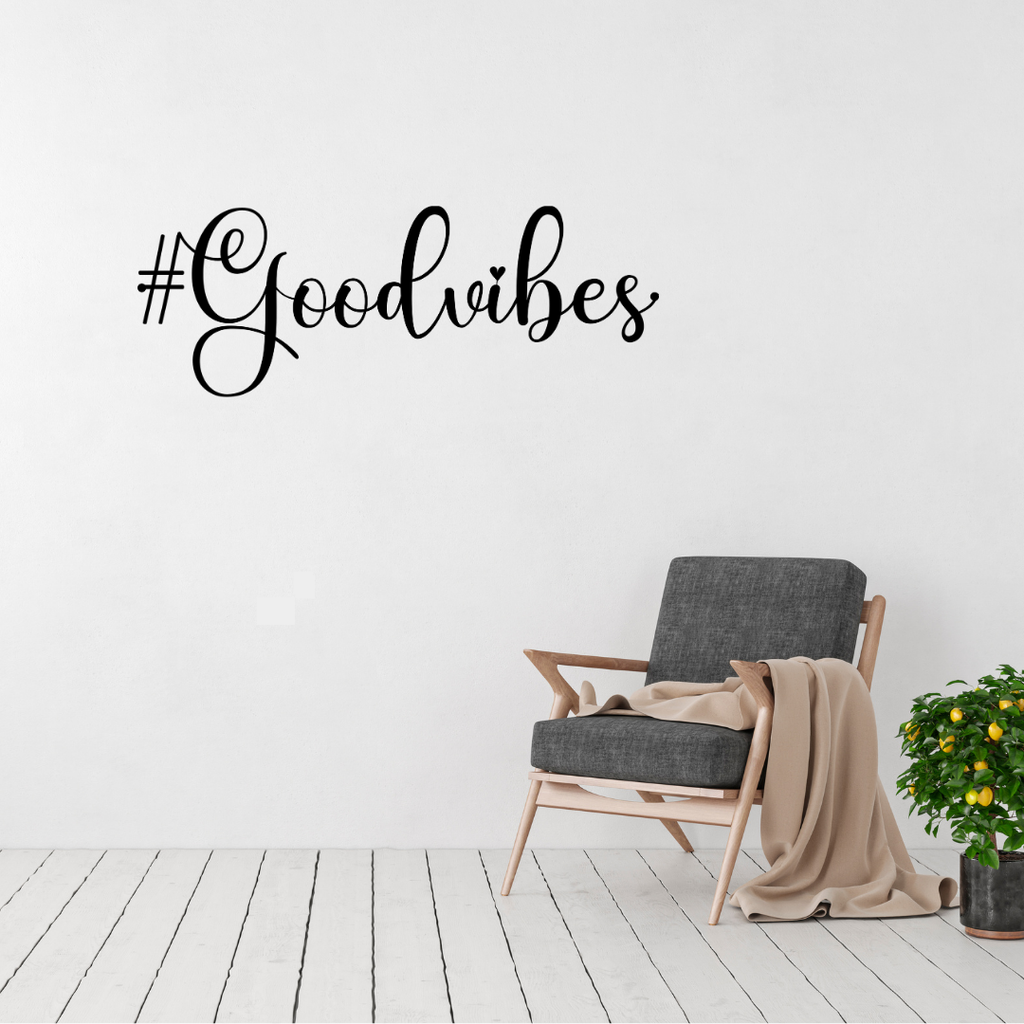 Positive Energy | #GoodVibes Metal Wall Art displayed in a bright modern living room.