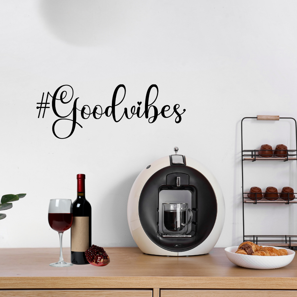 Positive Energy | #GoodVibes Metal Wall Art displayed above a stylish coffee station and kitchen counter.