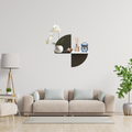 Quadrant Floating Shelf styled with books, candles and decorative accessories in a contemporary living room