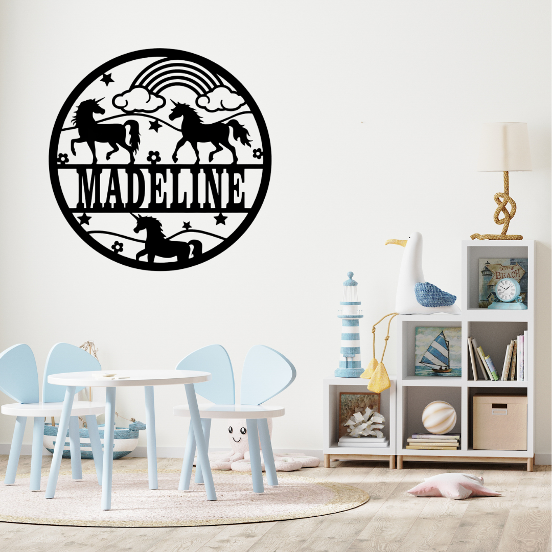 Magical unicorn wall décor styled above a pastel nursery crib