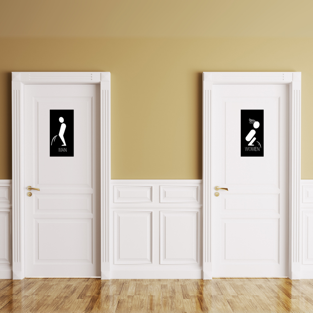 Relief Mode | Funny Male & Female Restroom Sign Set mounted on restroom doors in a stylish interior.