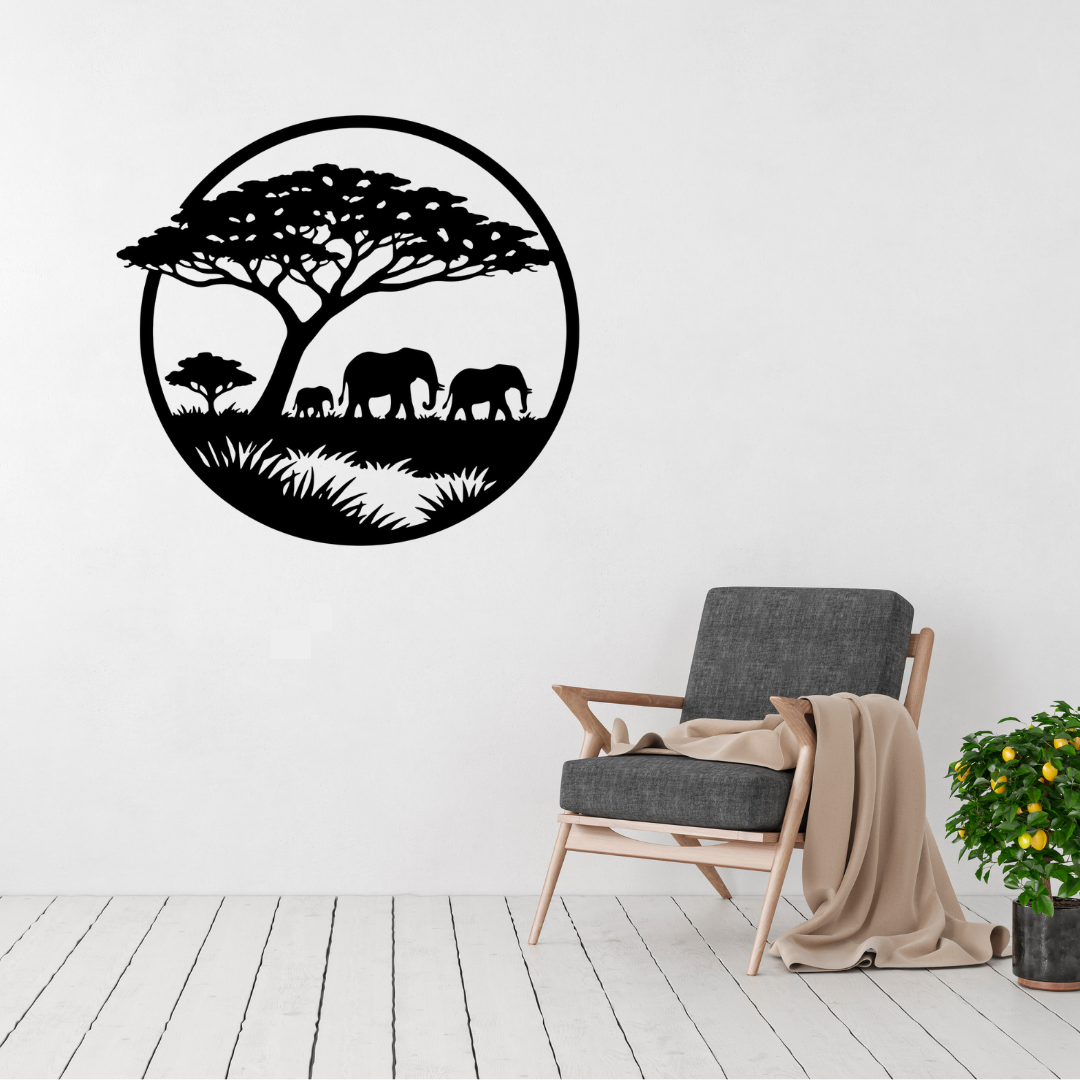 Safari Giants | Elephant Family Metal Wall Art displayed in a modern living room, featuring an elegant elephant family beneath an African acacia tree in a circular black metal wall art design inspired by the African savanna.