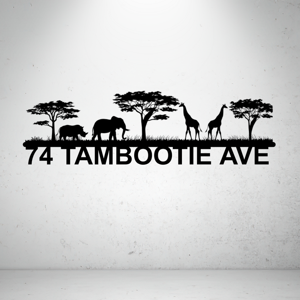 Metal house number sign with African wildlife silhouettes on a grey background