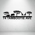 Metal house number sign with African wildlife silhouettes on a grey background