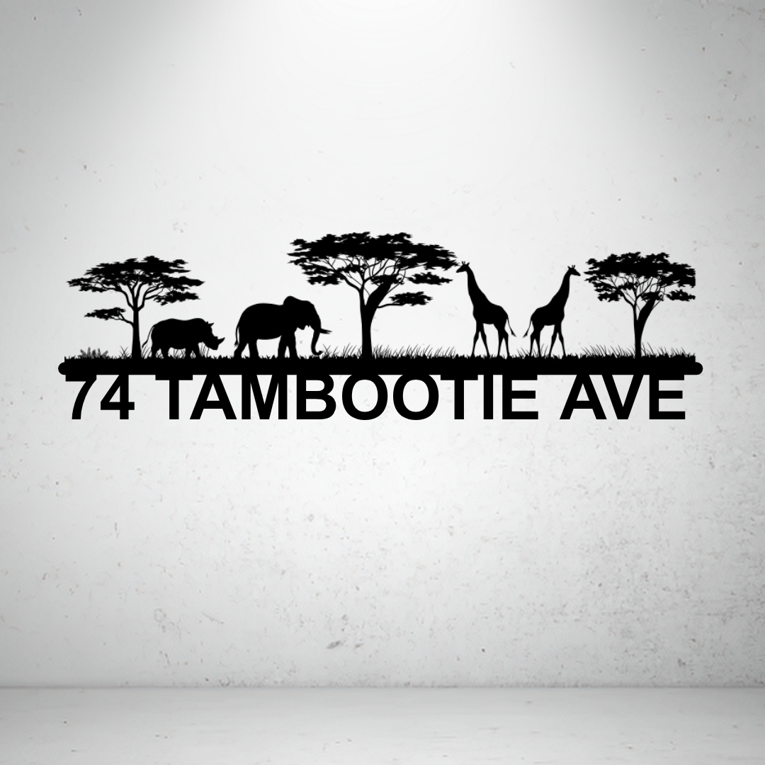 Metal house number sign with African wildlife silhouettes on a grey background