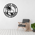 Sandy Toes, Salty Kisses | Coastal Sunset Metal Wall Art displayed in a bright modern living room.