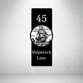Shipwreck Lane personalised vertical metal house number sign featuring a vintage sailing ship and custom street name.