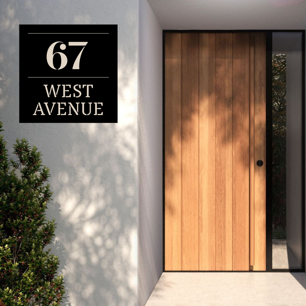 Metal house number and street name sign installed at a modern house entrance