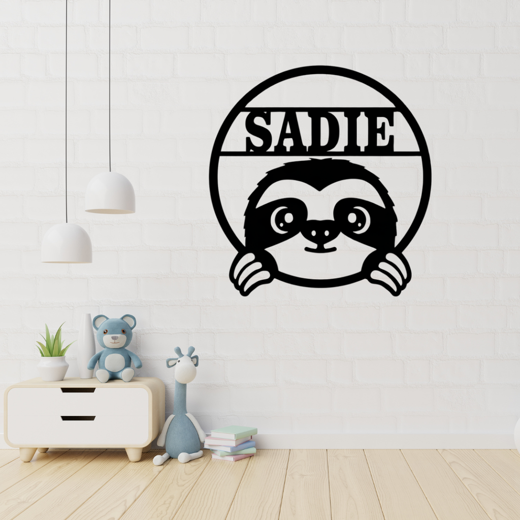 Cute sloth personalised metal wall art hanging in a jungle-themed nursery