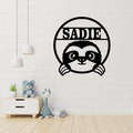 Cute sloth personalised metal wall art hanging in a jungle-themed nursery