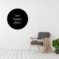 Spaces We Love | Our Happy Place Round Metal Wall Art displayed in a modern living room.