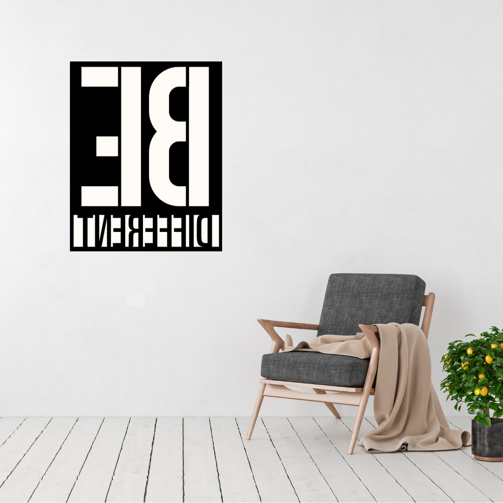 Stand Out | Be Different Metal Wall Art displayed in a contemporary living room.