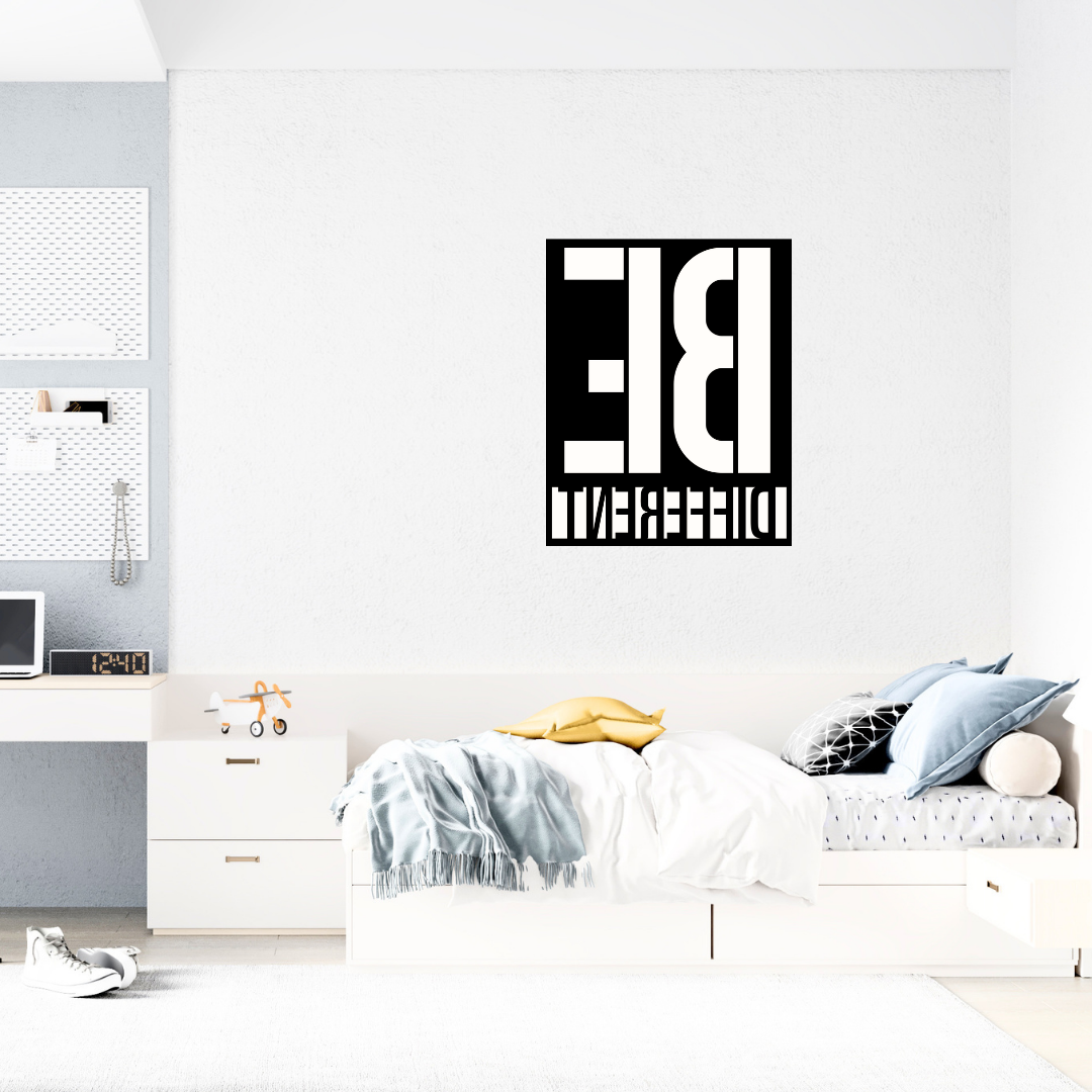 Stand Out | Be Different Metal Wall Art showcased in a stylish modern bedroom.