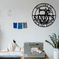 Sewing room metal wall sign displayed in a creative craft studio