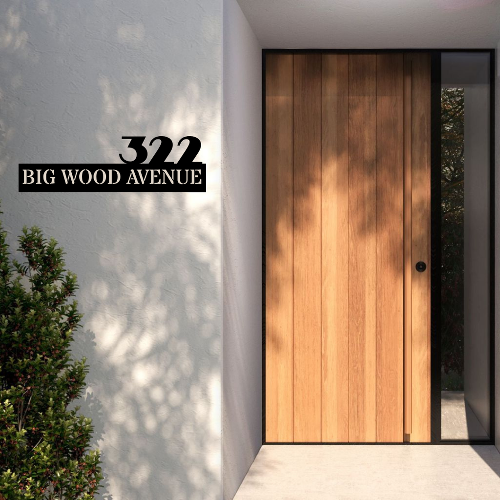 Metal house number and street name sign displayed at a stylish contemporary house entrance