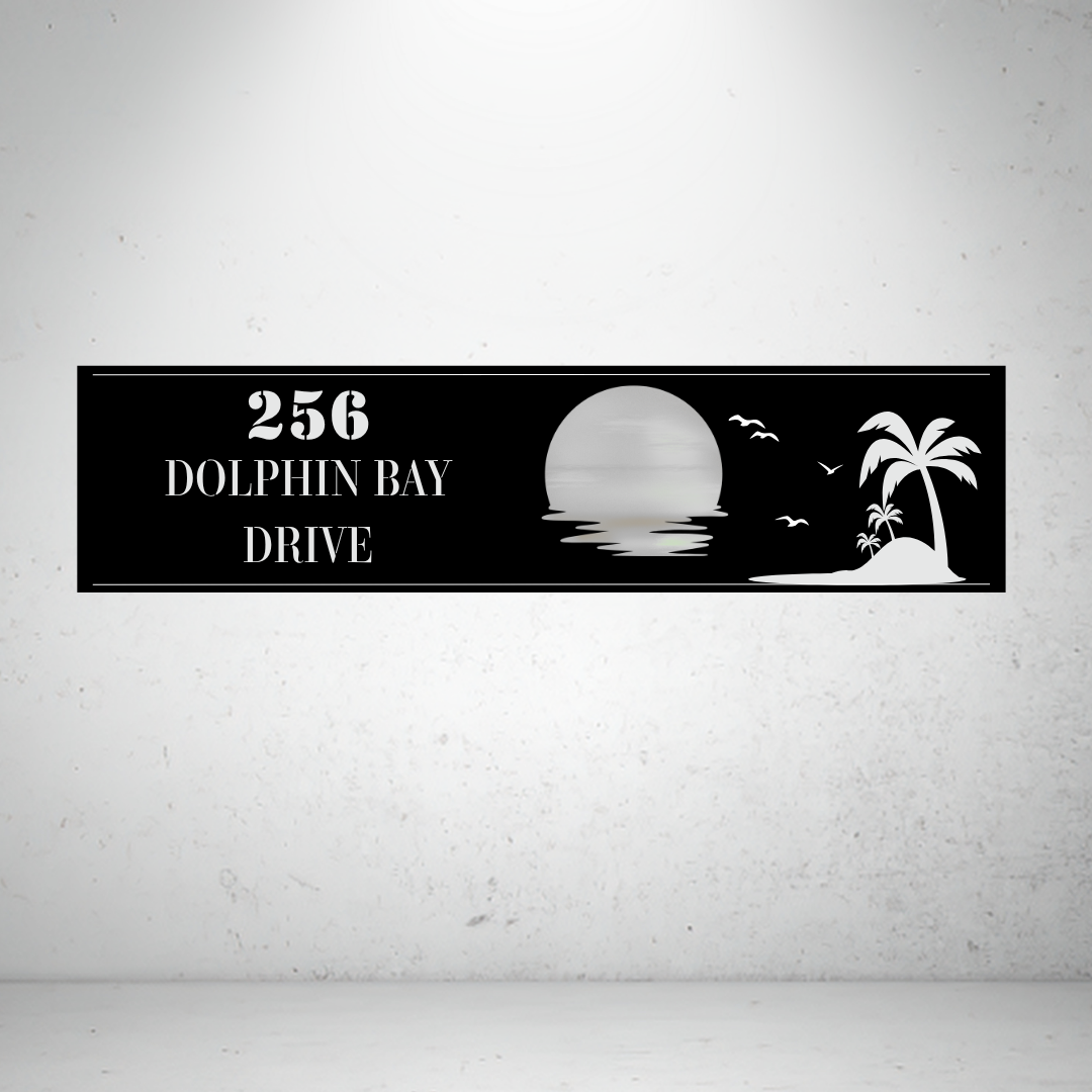Metal house number sign with sunset and palm tree design on a grey background